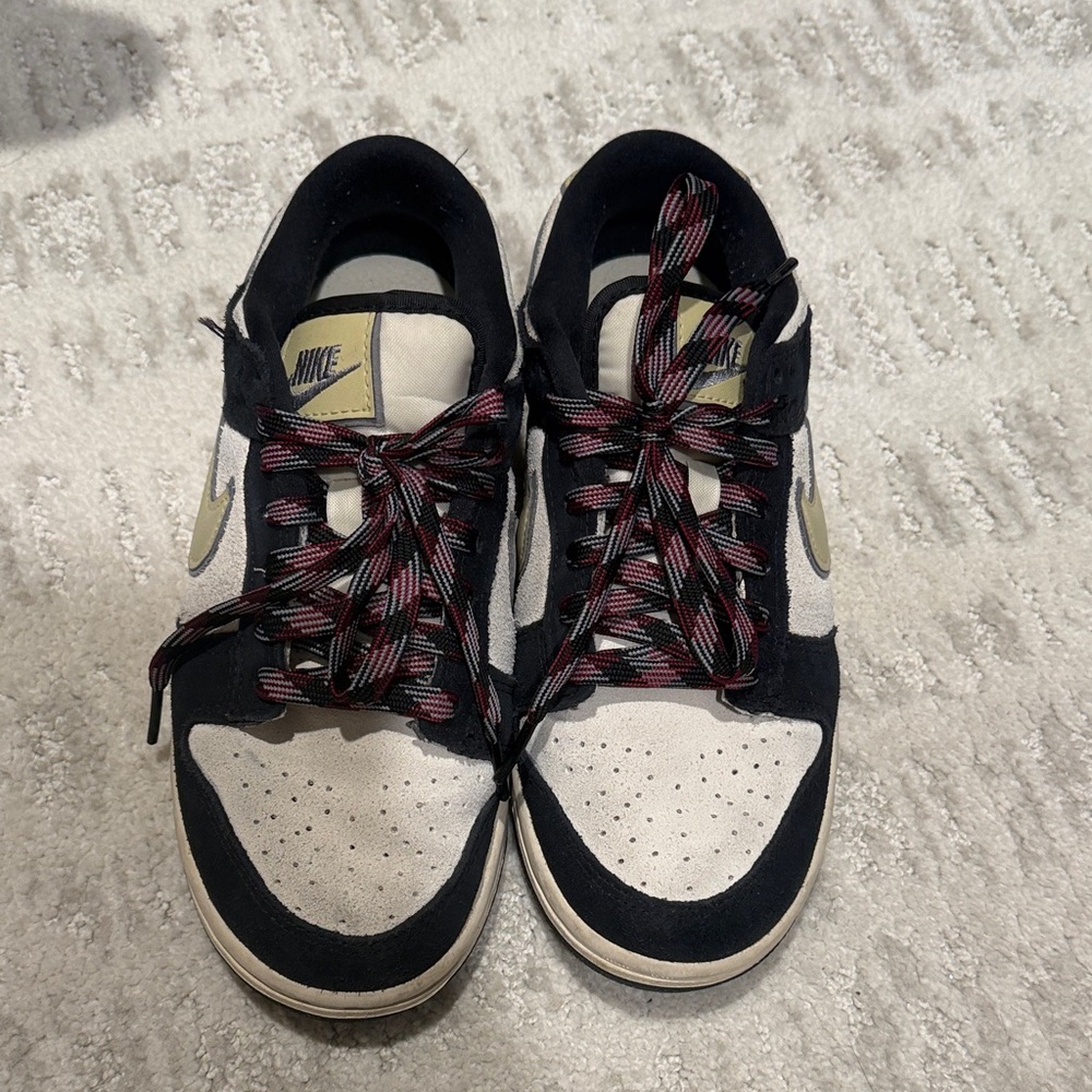 Nike Black and White Sneakers with Unique Laces